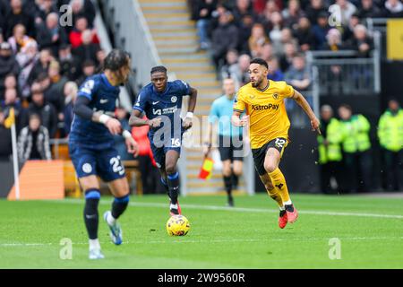 Wolverhampton, UK. 24th Dec, 2023. Wolves' Matheus Cunha races after the ball during the Premier League match between Wolverhampton Wanderers and Chelsea at Molineux, Wolverhampton, England on 24 December 2023. Photo by Stuart Leggett. Editorial use only, license required for commercial use. No use in betting, games or a single club/league/player publications. Credit: UK Sports Pics Ltd/Alamy Live News Stock Photo