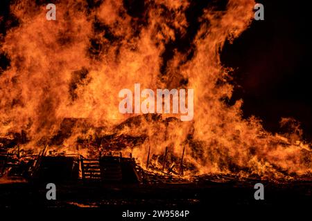 Large bonfire burning in the dark Stock Photo