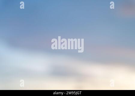 Blurred natural background texture of beautiful sky light with strange clouds in the morning or evening was taken at the sea. Stock Photo