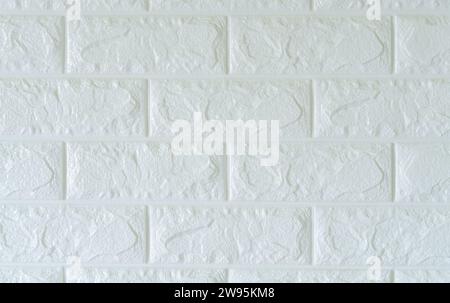 White foam brick wall is used for background or texture in decorative art work. Stock Photo