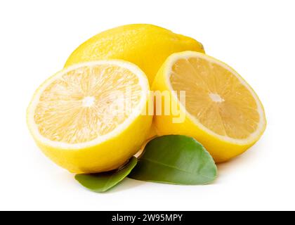 Single whole fresh beautiful yellow lemons with two halves and leaves is isolated on white background with clipping path. Stock Photo