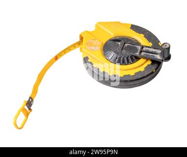 Old dirty yellow tape measure with scale is isolated on white background with clipping path. Stock Photo