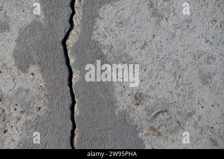 Vertical crack in concrete Low-quality concrete work Photo Stock Photo