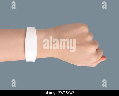 Silicon rubber bracelet mockup, key band with chip on hand wrist Stock Photo