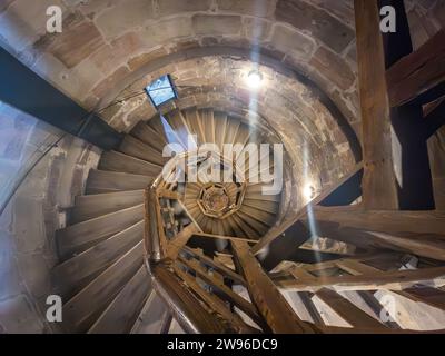looking down the staircase in a church tower Stock Photo