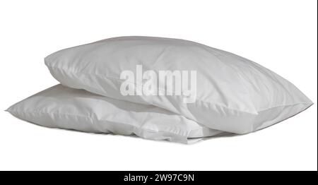 Two white pillows with cases after guest's use at hotel or resort room is isolated on white background with clipping path. Concept of confortable and Stock Photo