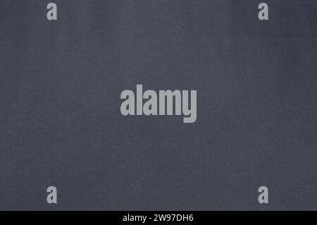 Black chart paper was taken for background texture, realistic dark background wall paper texture. Stock Photo