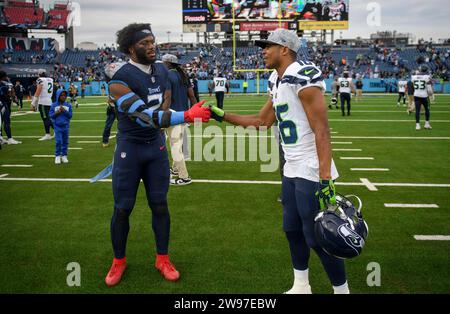 Nashville, Tennessee, USA. 24th Dec, 2023. Seattle Seahawks wide receiver Tyler Lockett (16) shakes hands with Tennessee Titans linebacker Azeez Al-Shaair (2) after their NFL game in Nashville. (Credit Image: © Camden Hall/ZUMA Press Wire) EDITORIAL USAGE ONLY! Not for Commercial USAGE! Stock Photo