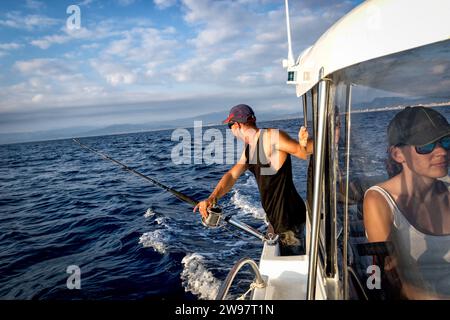 fishing boat in saltwater with trolling rods and reels Stock Photo - Alamy