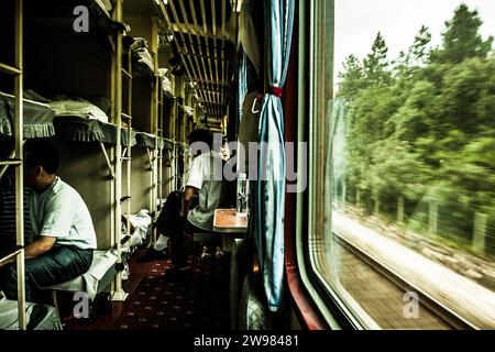 Passengers on a train in Hunan Province, China. Stock Photo