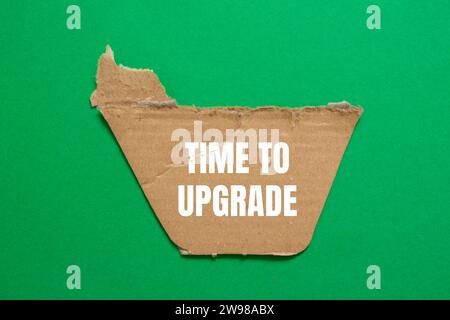 Time to upgrade lettering on ripped paper. Business concept photo. Stock Photo