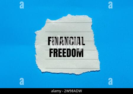 Financial freedom lettering on ripped paper. Business concept Stock ...