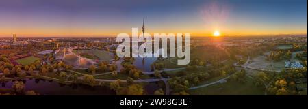 Sunrise Over Munich's Olympiapark with Iconic Towers and Autumn Hues. Stock Photo