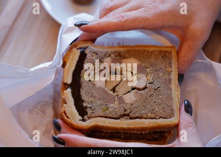 Périgord, France. December 25, 2023. Foie gras at Christmas meal in France. In France, and particularly in Périgord, duck or goose foie gras is one of the traditional dishes of the Christmas meal. Preparation of four different foie gras recipes before eating it during the meal. Photo by Hugo Martin/Alamy Live News. Stock Photo