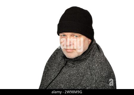 Cheerful Middle-aged Caucasian Worker in Black Winter Hat on White Background Stock Photo