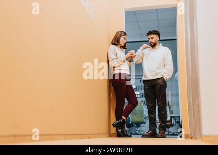 Successful teammates strategizing and collaborating on business growth and profit expansion in the office. Stock Photo