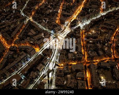 An aerial photograph of the city of Zurich, Switzerland at night covered in snow Stock Photo