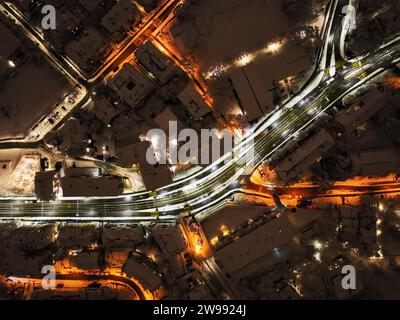 An aerial photograph of the city of Zurich, Switzerland at night covered in snow Stock Photo