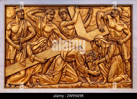 The Carrying of the Cross – Fourth Sorrowful Mystery. A relief sculpture in the Basilica of Our Lady of the Rosary of Fatima. Stock Photo
