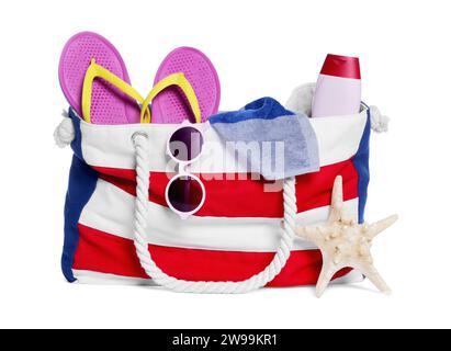 Stylish bag with starfish and other beach accessories isolated on white Stock Photo