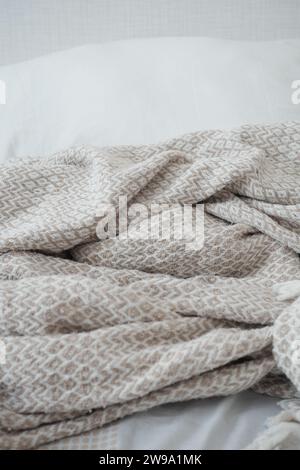 Bed with messy pick color Blankets, Stock Photo