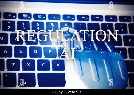 Robotic hand typing on a keyboard . Concept of future and AI. Stock Photo