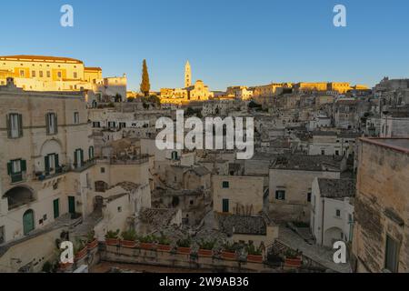 Matera, Italy - 26 November, 2023: view of the old city center of Matera with the stone houses in the last rays of sunlight Stock Photo