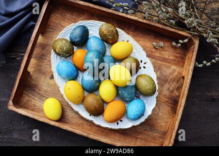 Stylish Easter table setting. Natural egg , modern plate. Easter table decoration ,. Stock Photo