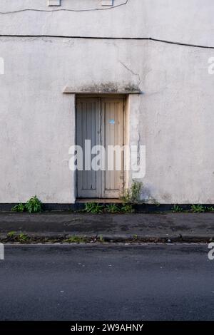White double door entrance to a building Stock Photo