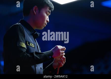 Macau, China. 26th Dec, 2023. Si Jiahui of China competes during the group A quarter finals against Mark Williams of Wales at the 2023 Macau Snooker Masters in Macau, south China, Dec. 26, 2023. Credit: Cheong Kam Ka/Xinhua/Alamy Live News Stock Photo