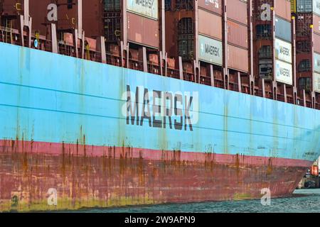 Miami, Florida, USA - 1 December 2023: Side of a large container ship operated by the Maersk shipping line in Miami docks Stock Photo