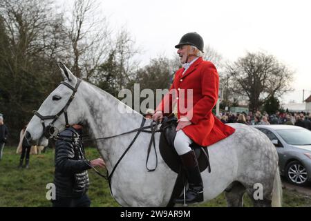 Hawridge, Chesham, UK. 26th Dec, 2023. Riders and their hounds gather in a field before the annual hunt. Credit: Uwe Deffner/Alamy Live News Stock Photo