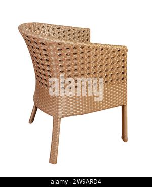 Armchair with soft pillows isolated on white. Wicker rattan furniture for the garden. Stock Photo