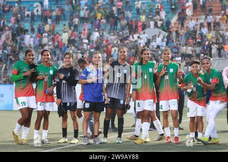 Bangladeshi footballers celebrate after win against Singapore in their FIFA friendly window with a thumping 8-0 win at the Birshreshtha Shaheed Mostaf Stock Photo