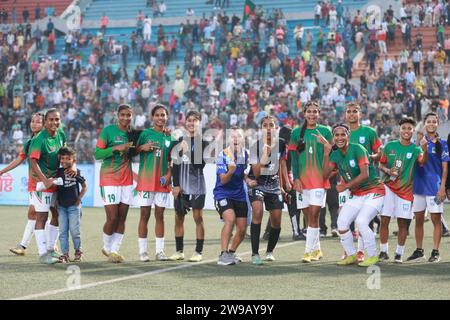 Bangladeshi footballers celebrate after win against Singapore in their FIFA friendly window with a thumping 8-0 win at the Birshreshtha Shaheed Mostaf Stock Photo