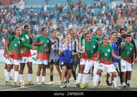 Bangladeshi footballers celebrate after win against Singapore in their FIFA friendly window with a thumping 8-0 win at the Birshreshtha Shaheed Mostaf Stock Photo