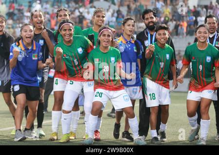 Bangladeshi footballers celebrate after win against Singapore in their FIFA friendly window with a thumping 8-0 win at the Birshreshtha Shaheed Mostaf Stock Photo