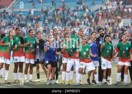 Bangladeshi footballers celebrate after win against Singapore in their FIFA friendly window with a thumping 8-0 win at the Birshreshtha Shaheed Mostaf Stock Photo