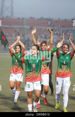 Bangladeshi footballers celebrate after win against Singapore in their FIFA friendly window with a thumping 8-0 win at the Birshreshtha Shaheed Mostaf Stock Photo