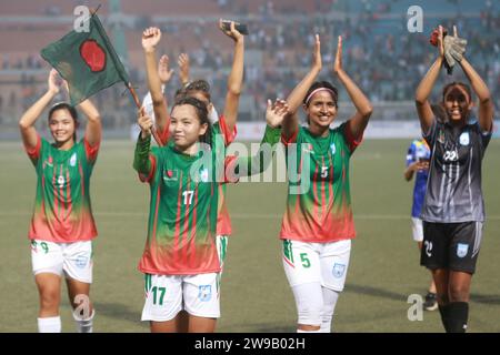 Bangladeshi footballers celebrate after win against Singapore in their FIFA friendly window with a thumping 8-0 win at the Birshreshtha Shaheed Mostaf Stock Photo