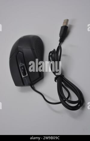 Computing Mouse With Wire Wireless computer mouse with USB adapter on a wooden background. View ...