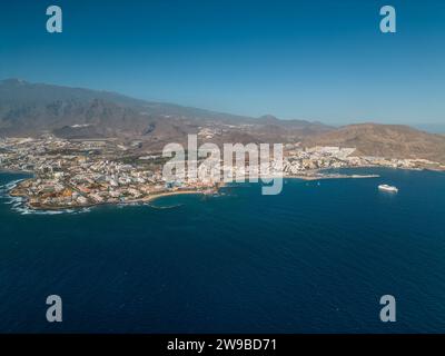 ocean shore with hotels and beach, Los Cristianos, Tenerife, Canary, aerial shot Stock Photo