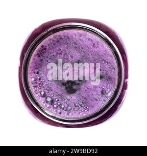 Carbon dioxide bubbles rise from fermented blue cabbage. Carbon Dioxide is an important byproduct of lactic acid fermentation. Stock Photo
