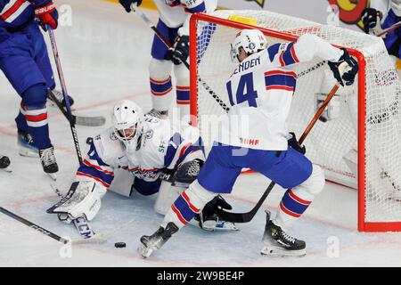 Norway's Markus Stensrud and Emil Wasenden during the IIHF World Junior Championship group B ice hockey match between USA and Norway at Frolundaborg i Stock Photo