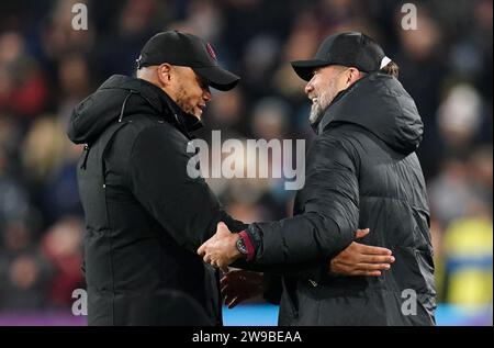 Burnley manager Vincent Kompany (left) greets Liverpool manager Jurgen Klopp before the Premier League match at Turf Moor, Burnley. Picture date: Tuesday December 26, 2023. Stock Photo