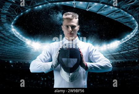 Portrait of a male fencer on the background of a sports arena. He holds a helmet in front of him. The concept of fencing. Mixed media Stock Photo