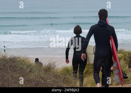 Hale Beach, Cornwall, United Kingdom. 26th Dec 2023. Local Surfers, families and dog walkers  enjoy Boxing Day on the Cornish beach of Hale. Stock Photo