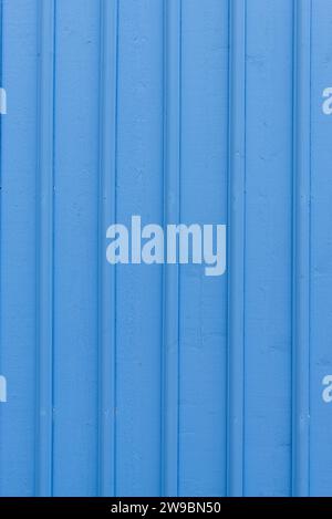 Blue painted boards of a wooden facade of a typical Swedish wooden house, Fiskebäckskil, Orust, Sweden Stock Photo