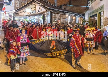 A ceremony procession in Aguas Calientes, Peru, celebrating the anniversary of Machu Picchu being declared a wonder of the world Stock Photo