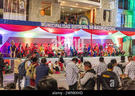 A ceremony procession in Aguas Calientes, Peru, celebrating the anniversary of Machu Picchu being declared a wonder of the world Stock Photo